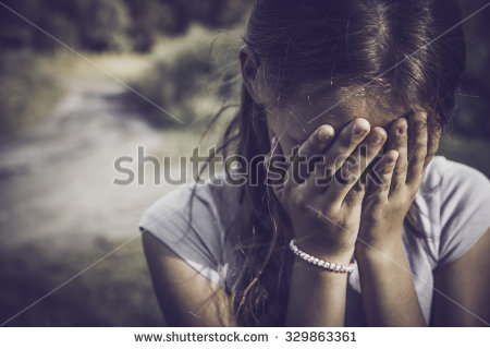 stock-photo-close-up-portrait-of-a-girl-crying-and-covering-her-face-329863361