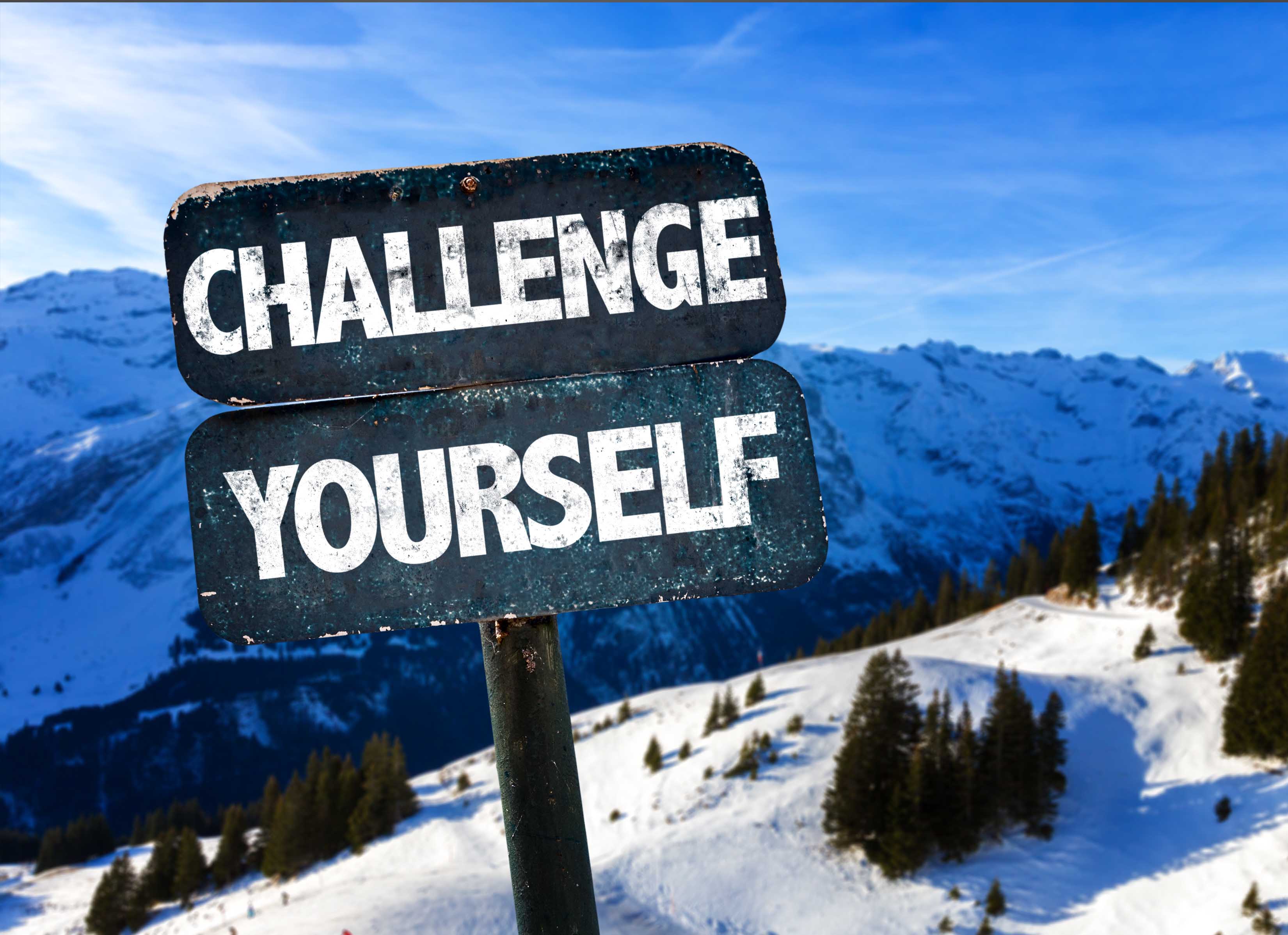 Challenge Yourself sign with sky background