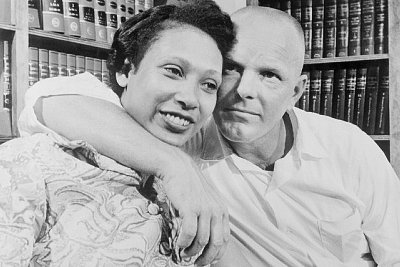 12 Jun 1967, Washington, DC, USA --- The Supreme Court ruled unanimously that a Virginia law banning marriage between African Americans and Caucasians was unconstitutional, thus nullifying similar statues in 15 other states. The decision came in a case involving Richard Perry Loving, a white construction worker and his African American wife, Mildred. The couple married in the District of Columbia in 1958 and were arrested upon their return to their native Caroline County, Virginia. They were given one year suspended sentences on condition that they stay out of the state for 25 years. The Lovings decided in 1963 to return home and fight banishment, with the help of the American Civil Liberties Union. --- Image by © Bettmann/CORBIS