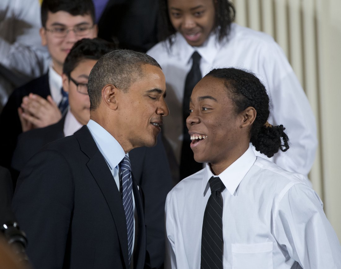 President Barack Obama speaks with Christian Champagne, 18, a senior at Hyde Park Career Academy in Chicago, who introduced him before launching a new initiative to provide greater opportunities for young black and Hispanic men called 'My Brother's Keeper' Thursday, Feb. 27, 2014, in the East Room of the White House in Washington. The White House is partnering with businesses, nonprofits and foundations to address disparities in education, criminal justice and employment. (AP Photo/Pablo Martinez Monsivais)