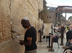 Dennis Okari Prays At The Wailing Wall